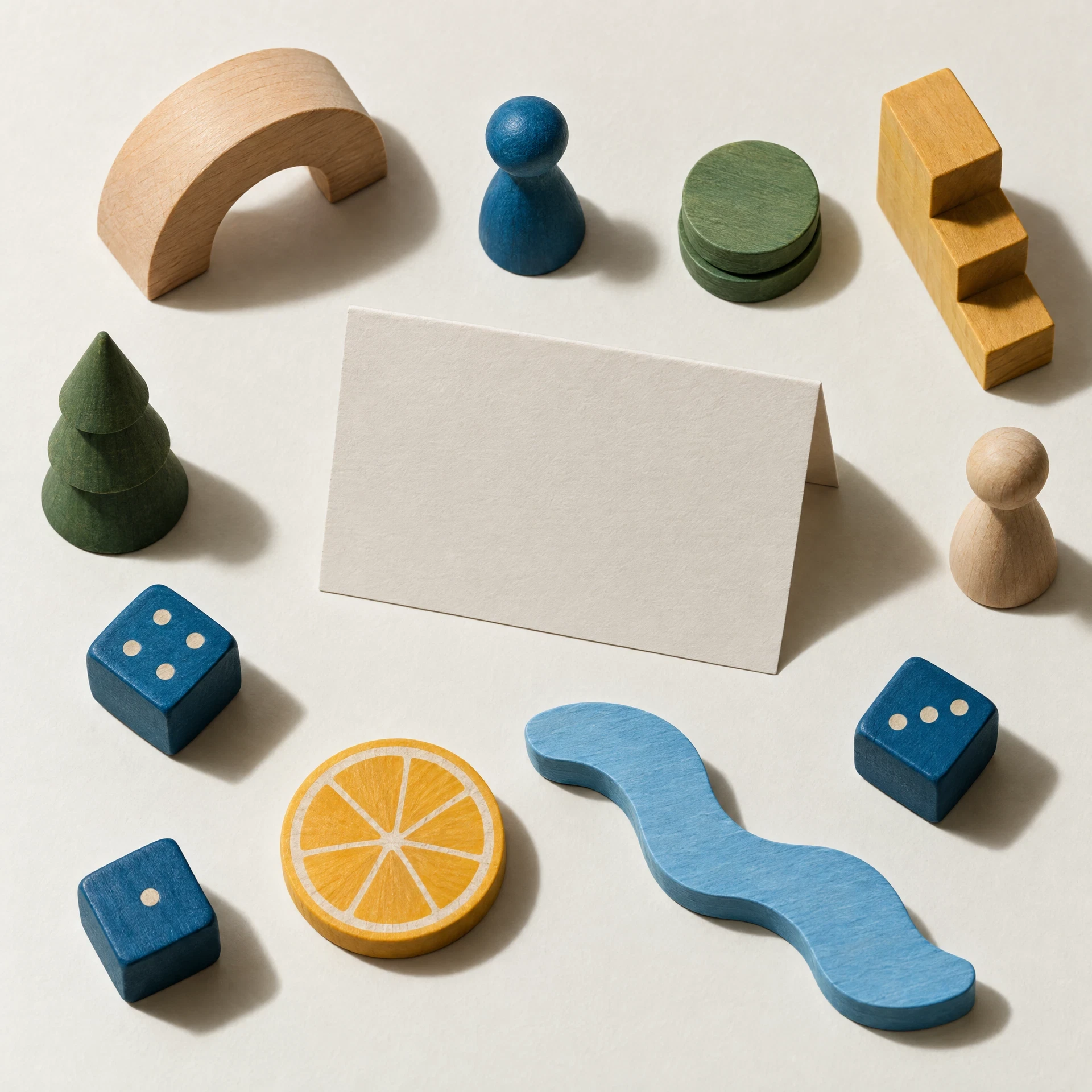 Abstract wooden pieces and blank folded score card